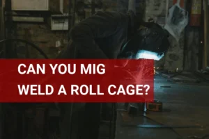 A welder expertly constructing a roll cage in a workshop, showcasing MIG welding techniques and attention to metal strength and safety.