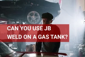 Mechanic repairing a gas tank with JB Weld in an auto repair shop, sparks flying from welding tools.