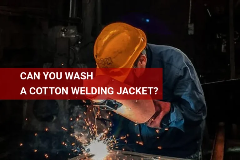 A welder in a cotton welding jacket works safely in a workshop, surrounded by flying sparks, highlighting the importance of proper protective gear and care, like washing cotton welding jackets for longevity.