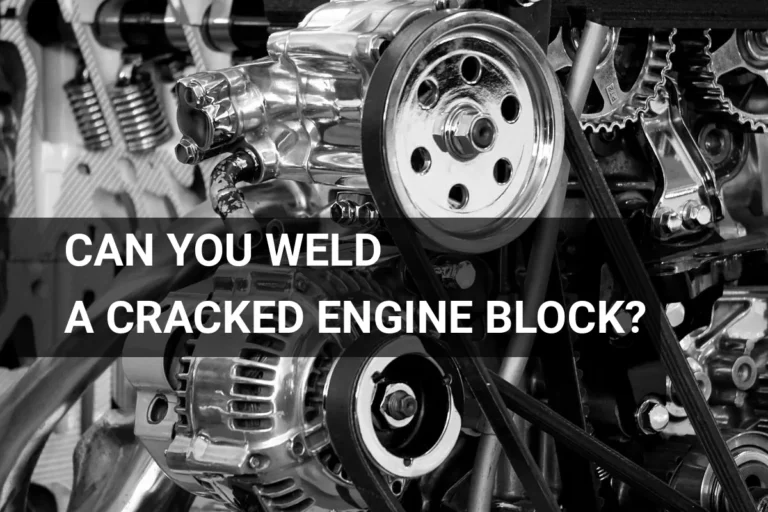 Close-up of a cracked engine block in need of welding, showcasing automotive repair techniques