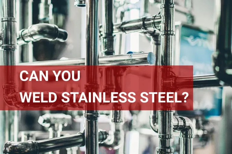 Close-up of stainless steel pipes being welded in an industrial setting, highlighting advanced welding techniques and engineering expertise.
