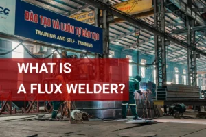 Workers skillfully operate a flux welder in a busy industrial factory, highlighting the importance of flux welding in metal fabrication.