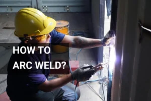 A skilled welder demonstrating arc welding techniques indoors, wearing safety gear for metalwork expertise.