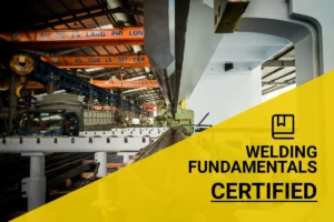 Interior view of a welding workshop showcasing advanced machinery and conveyor systems for certification training in welding.