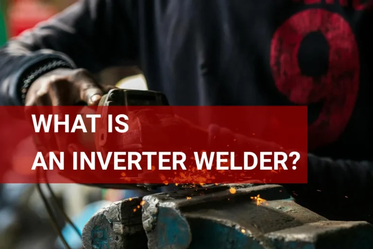 A worker using an inverter welder in a workshop, creating sparks as metal is shaped and joined together.