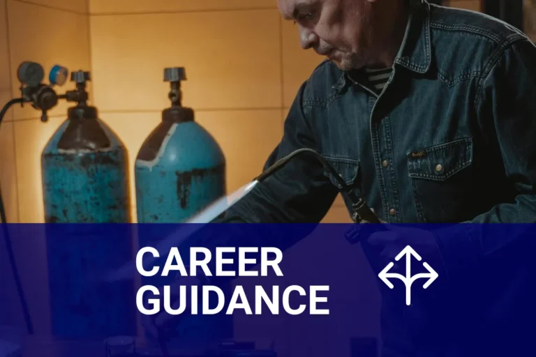 A journeyman welder skillfully using a welding torch in a metal workshop, surrounded by gas cylinders and welding equipment.