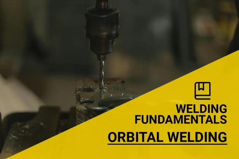 Close-up of orbital welding process in a workshop, showcasing metal joining with precision and efficiency.