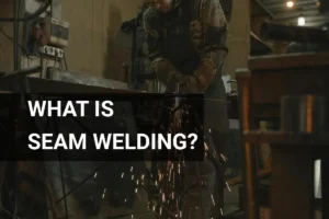 A skilled welder in safety glasses utilizes seam welding techniques in a factory, creating high-quality, durable welds while sparks fly.