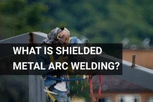 A construction worker performing shielded metal arc welding on a steel beam outdoors, surrounded by flying sparks and wearing appropriate safety gear to ensure protection.