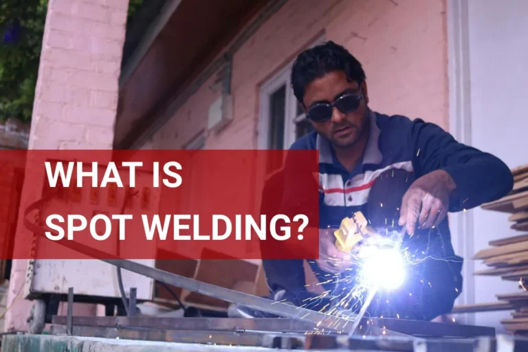Spot welding technique being performed by a man in sunglasses, showcasing precision and skill in metal joining.