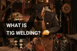 An artisan demonstrates TIG welding techniques in a vibrant Ankara workshop, highlighting traditional craftsmanship in metalwork.