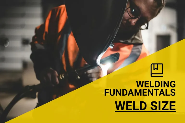 Welder in safety gear measuring weld size on metal structures in an industrial environment.