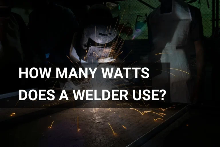Welder using high wattage equipment in a dimly lit workshop, creating sparks while working on metal.