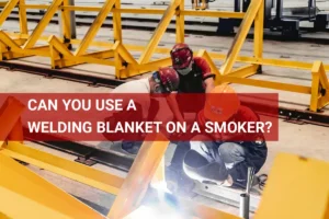 Workers using a welding blanket to protect equipment while smoking meat, showcasing safe practices for combining welding and outdoor cooking.