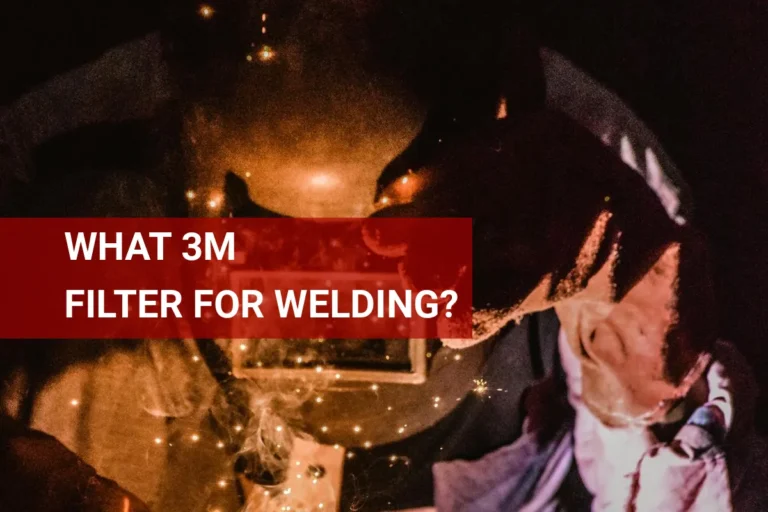 A welder in protective gear utilizes a 3M welding filter, working safely amid sparks in a dramatic, low-light environment.