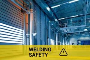 Welding galvanized steel in a modern warehouse setting, highlighting safety precautions to prevent health risks.