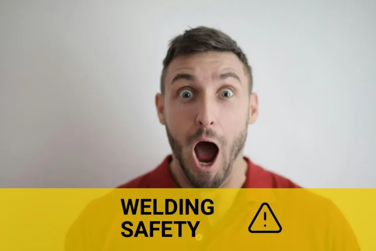 Man in a red polo shirt illustrating the effects of electric shock in the welding industry, showcasing surprise and concern for safety practices.