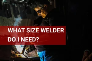 Discover the ideal welder size for your projects as a skilled blacksmith welds metal in a dimly lit workshop, emphasizing the art of metalworking.