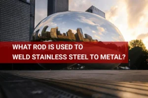 Close-up view of stainless steel welding rods used for joining stainless steel to metal, with a backdrop of the Chicago skyline at sunset.
