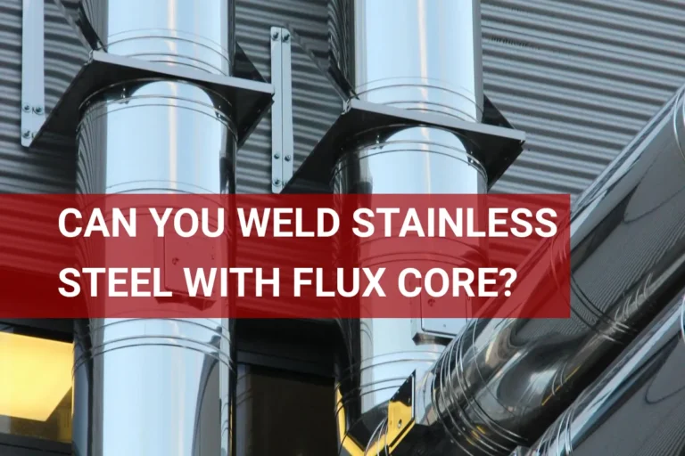 Close-up of shiny stainless steel pipes welded using flux core method, highlighting modern industrial technology.