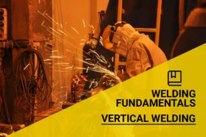 A welder in protective gear skillfully performs vertical welds in a workshop, with sparks flying around in the industrial setting.